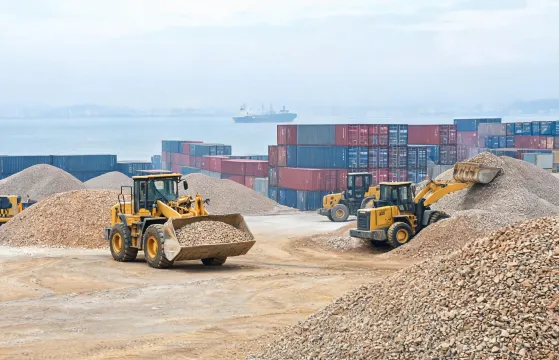 Wheel loaders on coastal port yard